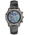 Go for dazzling accents with this chic and functional watch from GUESS.