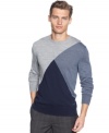 Boost up your look with this colorblock crewneck sweater from Calvin Klein.