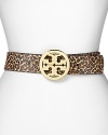 Give your waistline the designer treatment with Tory Burch's logo-decked belt. With gleaming hardware and snake-effect leather, slip this on to work an exotic edge.