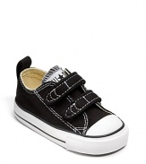 The classic Converse sneaker in a low-top, with contrast topstitching and velcro closure.