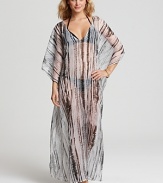 Make exotic glamour your poolside signature with this printed kaftan. An alluring ikat print adds drama, while a gauzy silhouette is cool no matter the temperature.