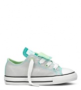 Double tongue Converse sneakers. A colorful canvas classic that transcends the ages.
