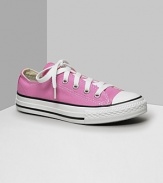 Low cut Converse All Stars. This classic canvas sneaker set the standard in cool and comfort. Available in infant sizes. With lace-up canvas uppers, contrast stitching and rubber sole and toe.
