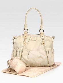 Sturdy and stunning for life on the go with your baby, in enduring nylon with faux leather trim and lots of thoughtful details.Double top handles, 10 dropRemovable, adjustable webbed shoulder strap, 16-25 dropTop zip closePleated, outside open pocketsOutside zipper detailInside open pocketsIncludes changing pad and insulated bottle caseInside clip-on case for phone, keys, credit card or lipstickFully linedNylon17W X 12H X 5DImported Sturdy and stunning for life on the go with your baby, in enduring nylon with faux leather trim and lots of thoughtful details.Double top handles, 10 dropRemovable, adjustable webbed shoulder strap, 16-25 dropTop zip closePleated, outside open pocketsOutside zipper detailInside open pocketsIncludes changing pad and insulated bottle caseInside clip-on case for phone, keys, credit card or lipstickFully linedNylon17W X 12H X 5DImported