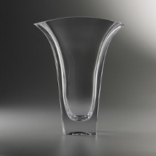 Bring sophistication and elegance to your foyer or dinner table with Karim Rashid's Planar Vase. Reminiscent of his ever popular Planar Bowl, this full-lead crystal vase has a beautifully wide opening to allow your flowers to fall softly against the edges. Bring sophistication and elegance to your foyer or dinner table with Karim Rashid's Planar Vase. Reminiscent of his ever popular Planar Bowl, this full-lead crystal vase has a beautifully wide opening to allow your flowers to fall softly against the edges.