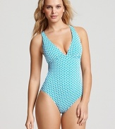 In a bold print and flirty low-back style, Echo's one piece suit is destined to become a summer favorite. When it's time to towel off, this suit plays coy beneath a sheer chemise.