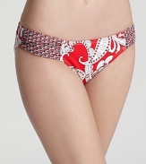 Tommy Bahama designs all its suits with figure flattery in mind. This paisley printed bottom boasts full coverage and a bright hue to guarantee you stand out poolside.