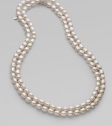This extra-long and elegant chain of gleaming baroque pearls can be double-wrapped for versatility.10mm baroque pearls Sterling silver Length, about 60 Made in Spain
