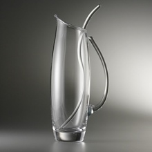 Invite peace and calm into your meals with our newest pitcher. Made of full-lead crystal, the Serenity Pitcher has an elegance and simplicity that soothes the beholder. Stir and serve your favorite cool beverage a colorful herbal iced tea with floating lemons, a batch of Mojitos or margaritas. Invite peace and calm into your meals with our newest pitcher. Made of full-lead crystal, the Serenity Pitcher has an elegance and simplicity that soothes the beholder. Stir and serve your favorite cool beverage a colorful herbal iced tea with floating lemons, a batch of Mojitos or margaritas.