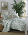 Escape to a tropical paradise. This Plantation Floral Aqua quilt from Tommy Bahama has a refreshingly calm appeal, featuring an allover tropical floral print in a cool aqua hue. Pure cotton sateen is embellished with stitching details and ivory trim for luxuriant texture. Reverses to self.