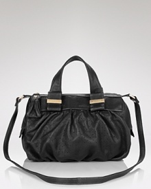 See by Chloé's mini satchel is cooly versatile. Dual purpose, this luxe leather bag is equally chic over the shoulder or crooked on a hard-hitting hand. See by Chloé's mini satchel is cooly versatile. Dual purpose, this luxe leather bag is equally chic over the shoulder or crooked on a hard-hitting hand.