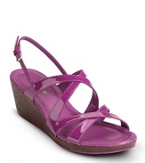 A strap-happy platform sandal in shiny patent. From Cole Haan.