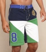 Pieced striping and a classic crest makes this trunks from Tommy Hilfiger your most stylish swimwear.