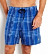 Don't let your beach style get washed out. These plaid trunks from Nautica are a fresh look for summer.