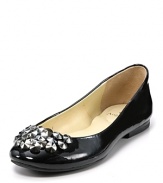 Glossy patent leather gets toughened up by heavy-duty studded hardware--an on-trend contrast that feels just right. From Enzo Angiolini.
