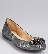 Shimmering snakeskin embossed leather adds sparkling style to a pair of jeweled flats from Enzo Angiolini.