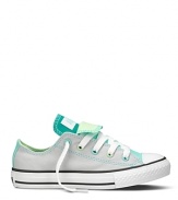 Double tongue Converse sneakers. A colorful canvas classic that transcends the ages.