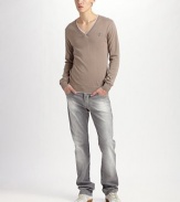 A soft fit and even softer drape in superior Italian cotton, shaped with a doubled v-neck and hem that offers the look of layers. V-neck Cotton Dry clean Imported