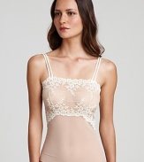 A body skimming sheer lace camisole with flattering floral details all over.