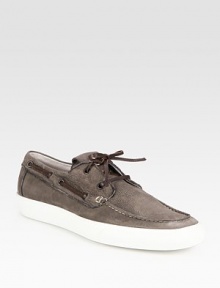 Contrasting rubber sole adds traction to this pebbled leather favorite with lace closure and side details. Leather liningPadded insoleRubber soleMade in Italy Contrasting rubber sole adds traction to this pebbled leather favorite with lace closure and side details. Leather liningPadded insoleRubber soleMade in Italy