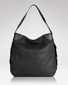 See by Chloé delivers a must-have hobo with twirled accents up both sides. The embellished boho-luxe bag complements a ladylike blouse and brightly-hued denim during work and play. See by Chloé delivers a must-have hobo with twirled accents up both sides. The embellished boho-luxe bag complements a ladylike blouse and brightly-hued denim during work and play.