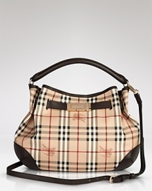 Chic and classic, Burberry's signature checked hobo is always in style. Chic and classic, Burberry's signature checked hobo is always in style.