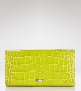 Croc-embossed leather lends chic texture to this bifold continental wallet from Longchamp.