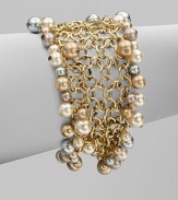 A chain link design embellished with multi-colored glass pearls. BrassGlass pearlsLength, about 7½Magnetic clasp closureImported 