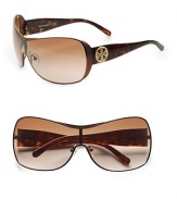 Sleek metal frames with logo accented acetate temples. Available in silver stingray with grey gradient lens or bronze with brown gradient lens. Logo temples100% UV protectionImported
