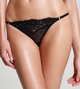 Turn up the heat in a mesh thong with flock dot embellishments from b.tempt'd.