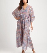 EXCLUSIVELY AT SAKS.COM. An inspiring paisley-printed, floor-skimming coverup.V-neckDolman sleevesPull-on styleDrawstring waistSilkDry cleanMade in Italy