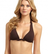 THE LOOKAdjustable triangle cupsAdjustable halter straps tie at neckKnotted centerBraided bottom strap ties at backTHE MATERIAL80% nylon/20% spandexCARE & ORIGINHand washMade in USAPlease note: Bikini bottom sold separately. 