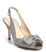 Glittery fabric lends sparkling glamour to Enzo Angiolini's Roxas slingbacks, effortlessly assisting your impending grand entrance.