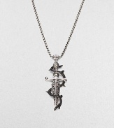 A bold, utterly modern look in sterling silver, detailed with a black sapphire vine. Sterling silver Sapphire Pendant, about 2 long Necklace, about 2 long Imported 