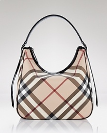Exude uptown chic with this classic hobo style in Burberry's famous check. Exude uptown chic with this classic hobo style in Burberry's famous check.