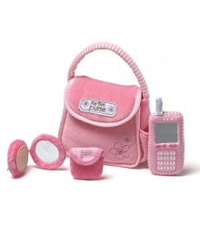 Pink purse with My First Purse embroidered on the front. Includes a cell phone with a mirror function and ring function, touch-and-close mirror compact with a rattle function and a change purse with a touch-and-close fastener. Pink purse with My First Purse embroidered on the front. Includes a cell phone with a mirror function and ring function, touch-and-close mirror compact with a rattle function and a change purse with a touch-and-close fastener.