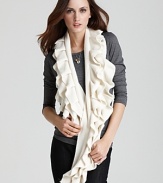 A ladylike ruffle scarf adds a new dimension to cold weather style.