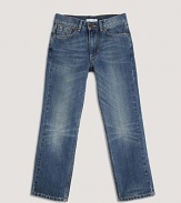 Five pocket jeans in a medium wash from Burberry.