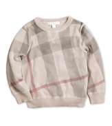 Burberry takes a new slant on a mainstay, rending the signature check print on this crewneck sweater big, bold and diagonal.