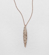 From the Miss Havisham Collection. A long tapered pendant, pointed like a spear, is dappled with dazzling Swarovski crystals and hangs from a delicate chain.CrystalRose goldtoneLength, about 16 plus 3 extenderLobster claspMade in USA
