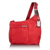 Keep the essentials close at hand with this slim crossbody bag. Perfect for travel or everyday use, this lightweight nylon design has leather trim and offers a variety of interior and exterior organizer pockets.