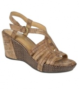 Get back to nature. Earthy hues and finishes create a beautiful effect on the comfortable Naza wedge sandals by Naturalizer.