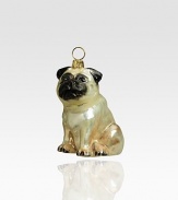 A precious little pug is handpainted with intricate breed details by Polish artisans in mouth-blown glass. Handpainted glass Each ornament takes 7-10 days to complete Arrives in gift box ideal for giving or storing 1½W X 3H X 2D Handmade in Poland 