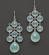 Softly-hued seafoam chalcedony, set in sterling silver, mimics the color of a summer sky. By Elizabeth Showers.
