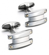 Industrial chic. These unique bar-shaped cuff links feature a sterling silver setting with 18k gold accents. Approximate length: 7/8 inch. Approximate width: 1/2 inch.