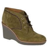 Casual chic defines Naturalizer's Kaitlyn ankle boots. Crafted in suede with a lace-up closure on the vamp, they feature a trendy wedge silhouette. They're completely comfortable as well, thanks to a round-toe shape and wearable heel.