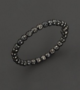 Gleaming black gold ring, lovely alone or perfect for stacking.