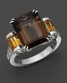 Pavé diamonds and citrine baguettes frame a 6.09 ct. t.w. smoky quartz, set in 18K white gold. Pavé diamonds and citrine baguettes frame a 6.09 ct. t.w. smoky quartz, set in 18K white gold.