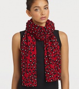 A warm knitted wool design with a bold and fun print. WoolAbout 12 X 86Dry cleanImported 