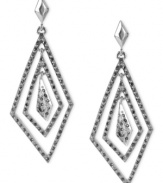 Kenneth Cole New York dazzles with this set of geometric drop earrings. The orbital pair, crafted from silver-tone mixed metal, radiates with pave glass crystal accents. Approximate drop: 3-1/4 inches.